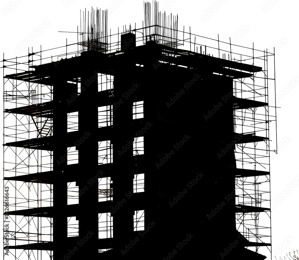 Silhouetted building under construction