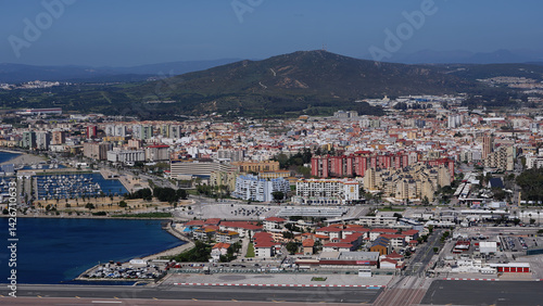 Gibraltar international airport runway intersecting with city and marina - GIBRALTAR, UK - MARCH 31, 2025