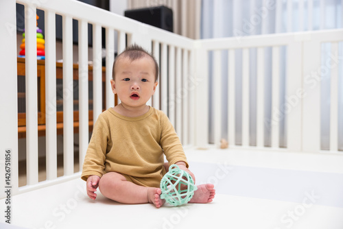 Obraz na płótnie Baby Sitting in Playpen Indoors at Home w salonie