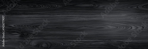 Elegant black wood grain texture ideal for enhancing creative projects.
