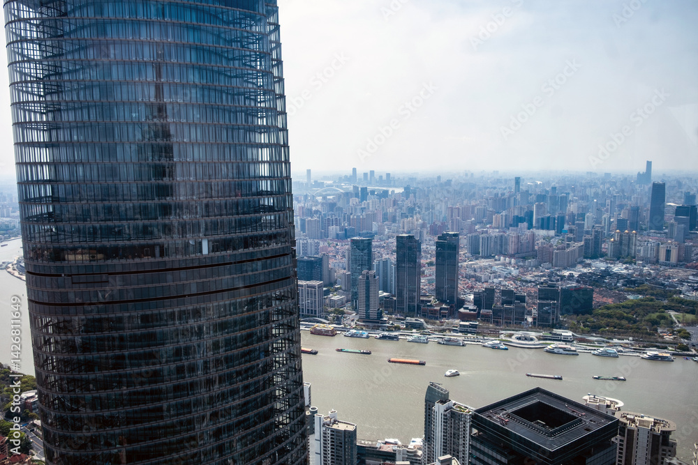 Shanghai city skyline view from above. High rise business skyscrapers in Lujiazui and Huangpu River. China
