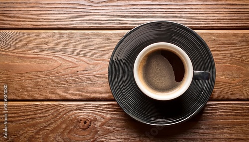 black coffee cup on wood background