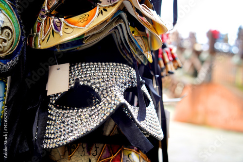 Fototapeta Naklejka Na Ścianę i Meble -  Typical masks in Venice in a street stall