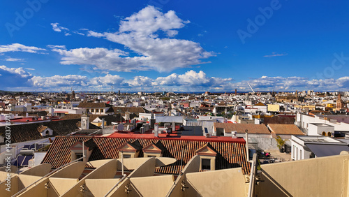 Panoramic view of Seville cityscape with traditional architecture under blue sky - SEVILLE, SPAIN - MARCH 25, 2025