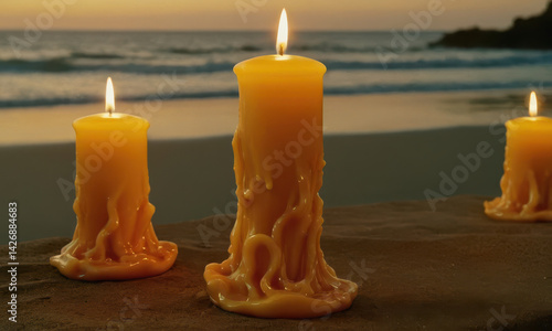 Obraz na płótnie Three candles lit up on a wooden table, perfect for creating cozy ambiance or as decorative element in home decor w salonie