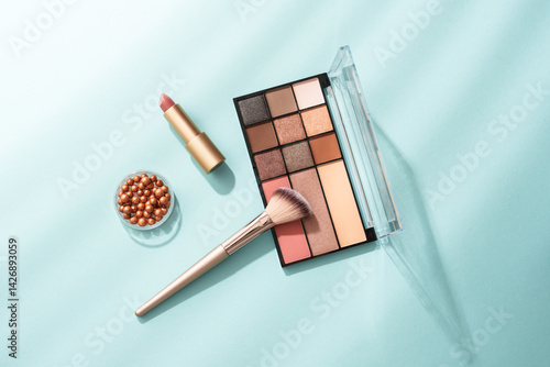 Obraz na płótnie Beauty products for professional make up with shadows. Flat lay on blue background. w salonie