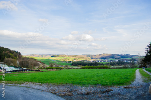 Obraz na płótnie Traditional German village in scenic green hills w salonie