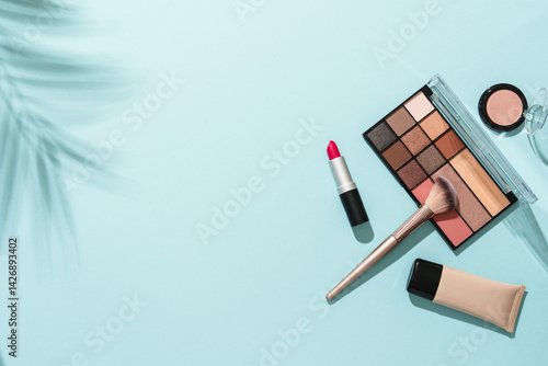 Obraz na płótnie Beauty products for professional make up with shadows. Flat lay on blue background. w salonie