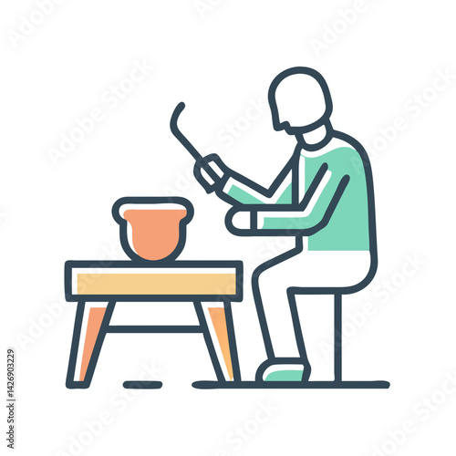 Potter at work crafting pottery on a pottery wheel
