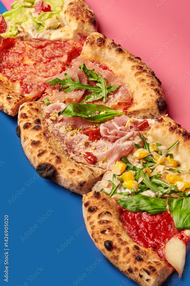 Gourmet pizza slices with various toppings on colorful background