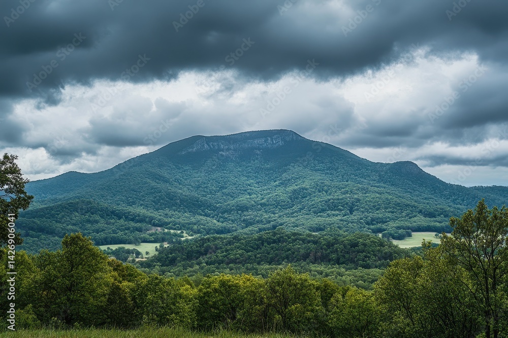 Cloudy day over a majestic mountain range with lush greenery in the foreground, Mountain on cloudy day