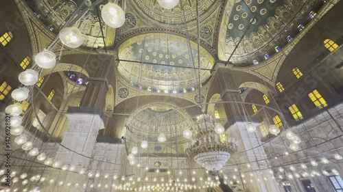 Capture the illuminated interior of Mohammed Ali Mosque, with its alabaster glow and Cairo Citadel view. Perfect for projects highlighting Islamic architecture and art.