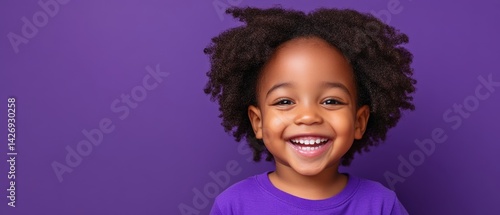 happy african american child smiling on purple background
