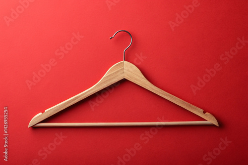 coat hanger isolated on red background