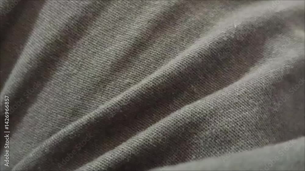 It emphasizes different textures, from soft and luxurious fabrics like silk to durable, wear-resistant material It emphasizes different textures, from soft and luxurious fabrics like silk to durable, wear-resistant material