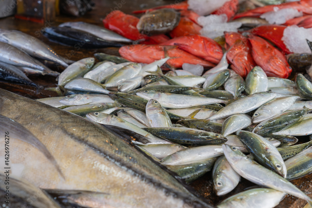 Fototapeta premium Fish on display in street. side Asian wet fish market