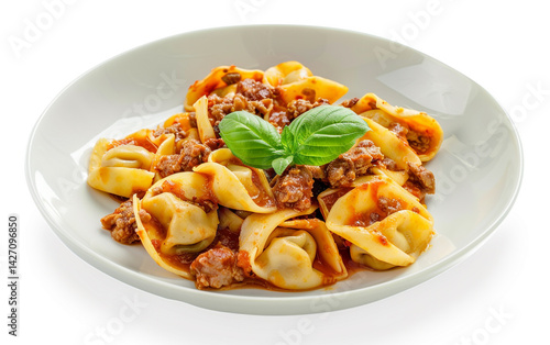 A hearty plate of tortellini pasta tossed in a rich Bolognese sauce, garnished with fresh basil leaves.