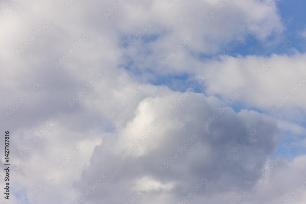 Fototapeta premium Bright Blue Sky with Fluffy White Clouds, BC, Canada
