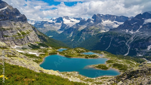 Obraz na płótnie Breathtaking view of an alpine lake nestled amidst a stunning mountain landscape. w salonie
