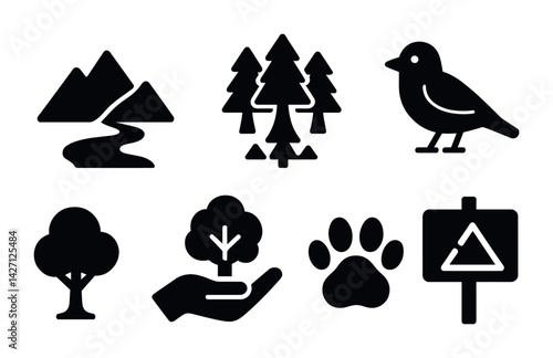 Nature and wildlife solid icons set – minimalist ecology and conservation symbols for environmentally friendly projects: mountain, forest, bird, tree, hand, paw, sign