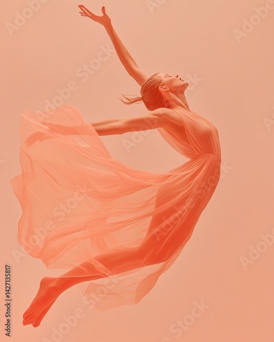 A graceful ballet dancer in mid-air