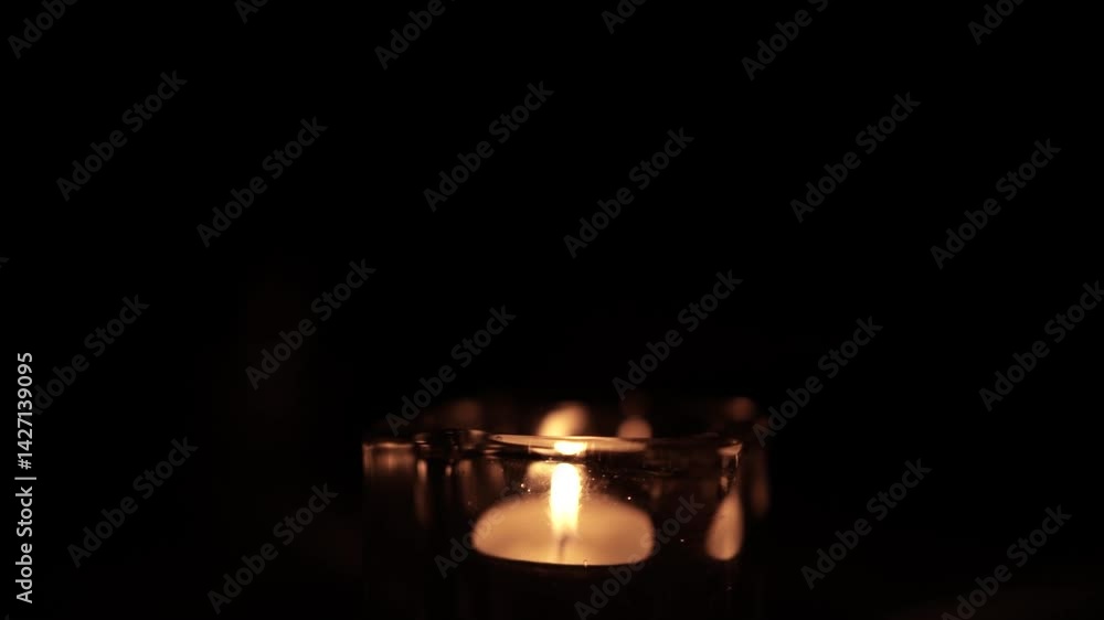 Candle Lit in Darkness with Soft Glow Candle Lit in Darkness with Soft Glow