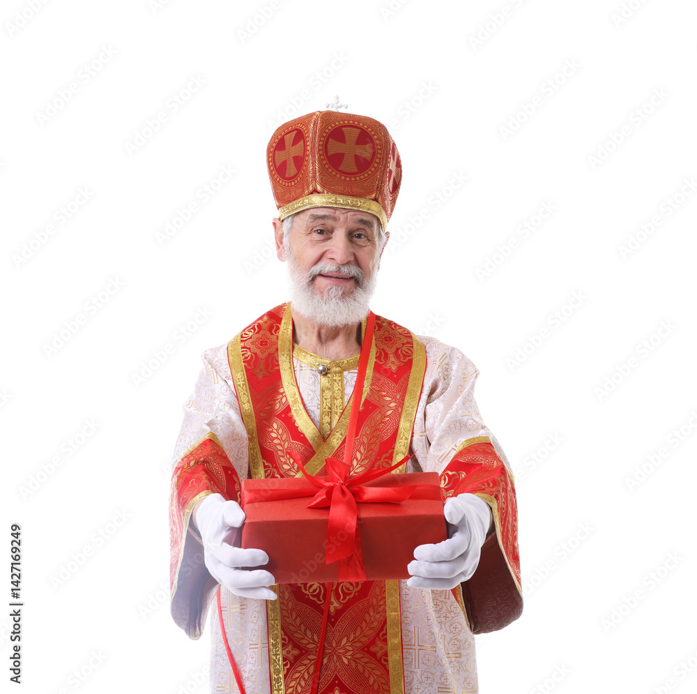 Fototapeta premium Saint Nicholas giving gift on white background