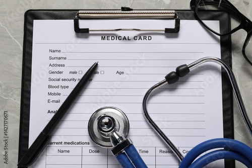 Obraz na płótnie Flat lay composition with medical card form on grey background w salonie