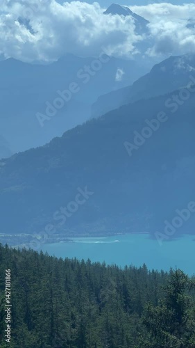 Breathtaking Scenic Mountain View Featuring a Serene Lake Surrounded by Lush Forests