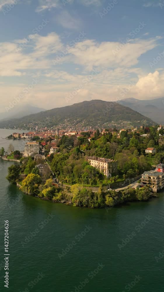 Aerial view of Lake Como, Italy. Beautiful lake surrounded by Alps mountains, charming towns, and green landscapes. Scenic nature and travel destination in Europe Aerial view of Lake Como, Italy. Beautiful lake surrounded by Alps mountains, charming towns, and green landscapes. Scenic nature and travel destination in Europe