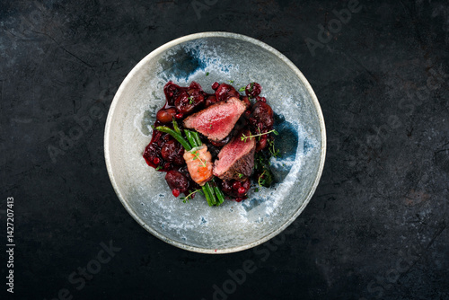 Bilde på lerret Traditionally roasted fillet of saddle of venison with chestnuts, bacon-wrapped
