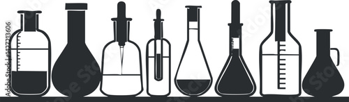 A collection of various laboratory glassware including beakers, flasks, and test tubes.