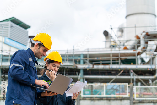 Petrochemical factory industry engineer teamwork meeting discussion at petroleum oil refinery plant. Industrial engineering technician working and maintenance manufacturing energy power gas system.