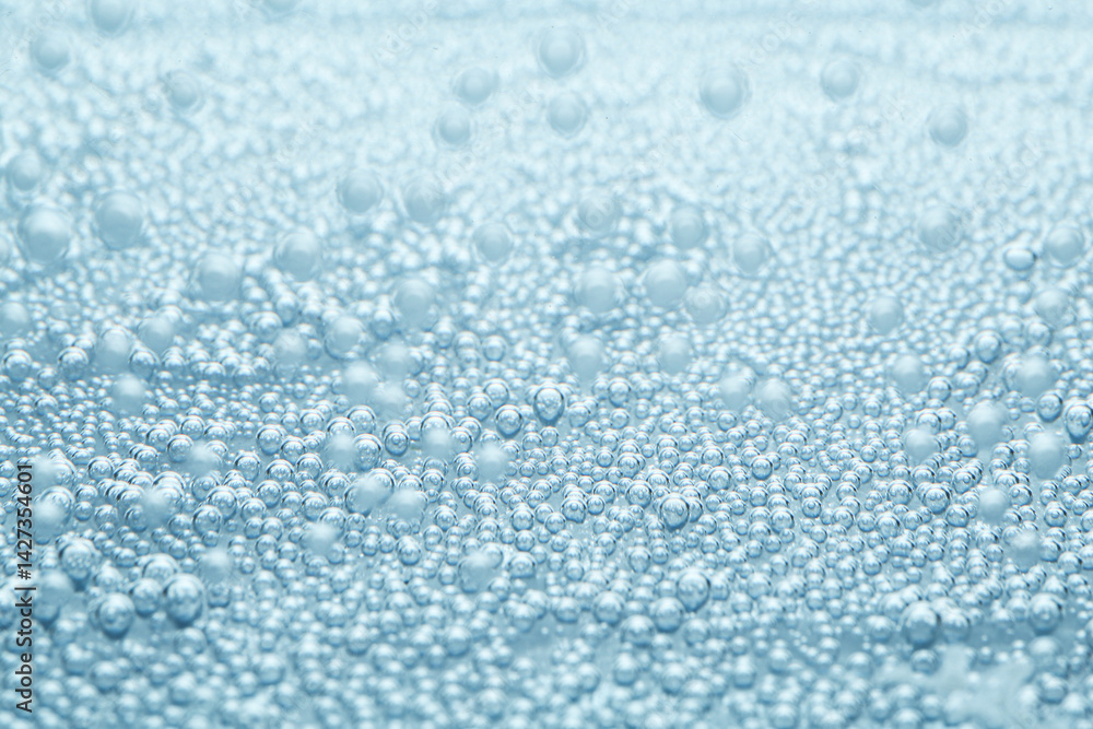 Obraz premium Soda water with bubbles as background, closeup