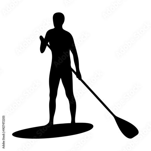 Silhouette of a paddle boarder using a paddle in black and white