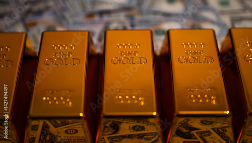 Obraz na płótnie Dollars with gold bar background. Precious metals. Saving finance in gold bar. Dollars vs gold bar. Saving money background. Dollar bills vs gold bars. Banking and savings. Golden metal. w salonie