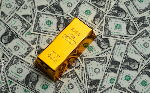 Obraz na płótnie Money dollars gold bar. Saving finance in gold bar. Dollars vs gold bar. Saving money background. Dollar bills vs gold bars. Banknotes and goldbar. Banking and savings. Golden money. Precious metals. w salonie