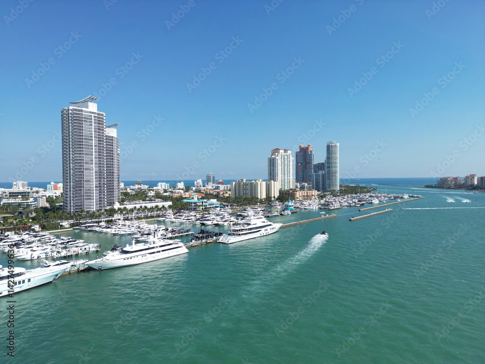 Miami beach cityscape. Miami summer aerial view. Miami Beach shoreline. South Beach Miami aerial view. Blue ocean in Florida skyline. Miamis cityscape. Ocean coast.