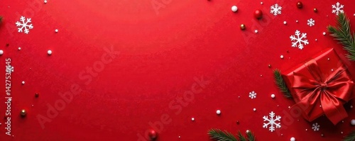 Bright red wrapping paper with scattered snowflakes, snow, holiday