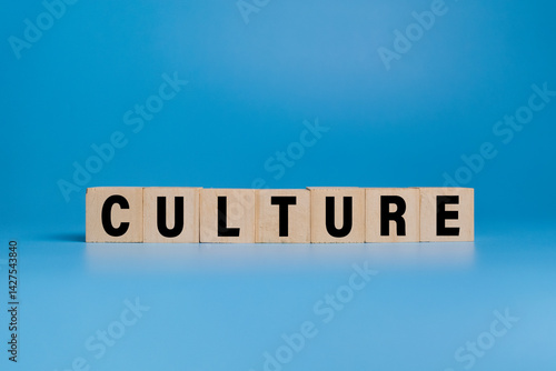culture word text on wooden blocks isolated on blue background