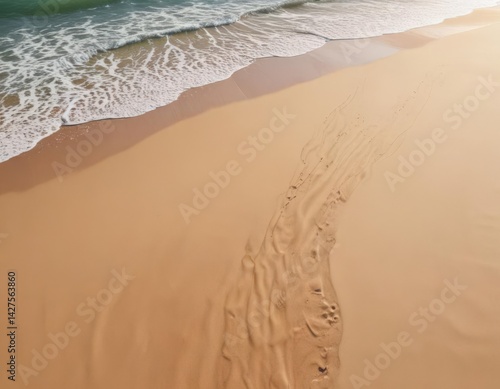 Emerald green waves curl and break on a golden sandy beach, sunlight reflecting on the wet sand , green, ocean