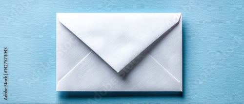 Obraz na płótnie Closed envelope resting on a textured blue background, conveying a sense of communication and anticipation. Business Strategy, Customer Focus concept w salonie