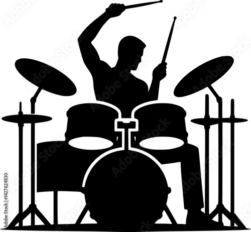 Silhouette of a Drummer Playing Drums