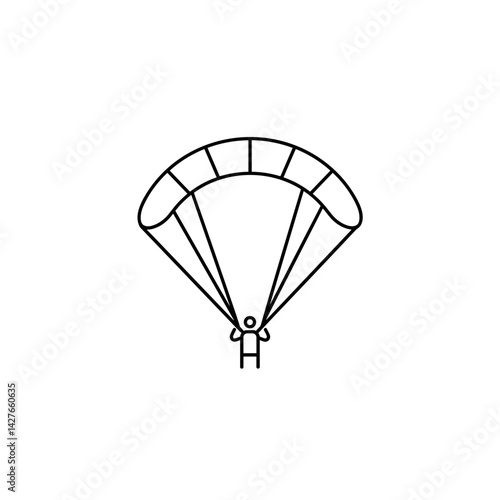 Paraglider soaring mid-air against a clear sky  