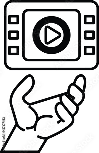 A hand holding a red and white video game controller