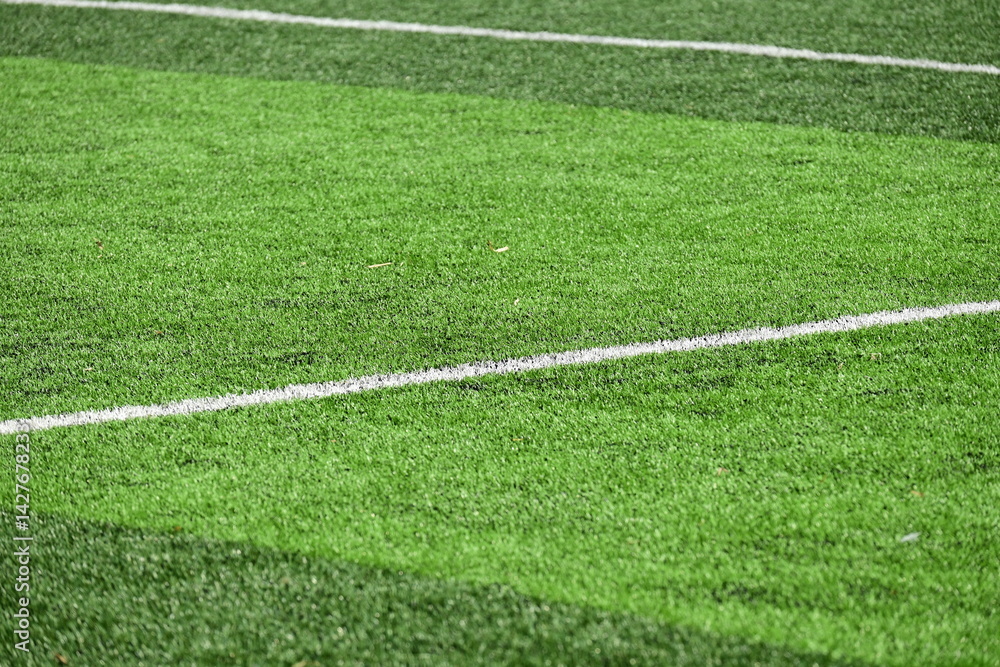 Obraz premium artificial green grass background for playground