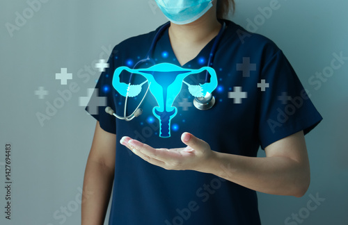 Female doctor hold a virtual of uterus. Woman healthcare, Uterine fibroid, Infertility, Cervical cancer awareness.