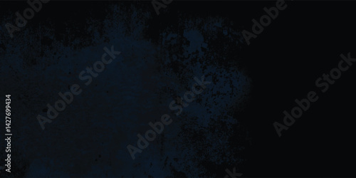 Blotchy dark blue design macro shot revealing surface texture and variations.
