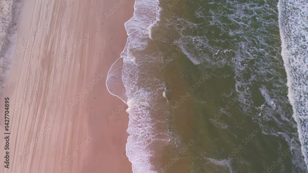 Aerial view looking down on the shore line along Ocean Beach on Bribie Island, Queensland, Australia Aerial view looking down on the shore line along Ocean Beach on Bribie Island, Queensland, Australia