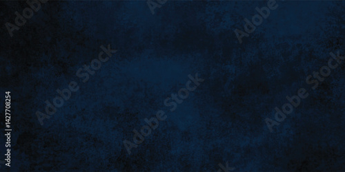 Dark blue grunge surface with ink marks and a distinctly distressed appearance.





